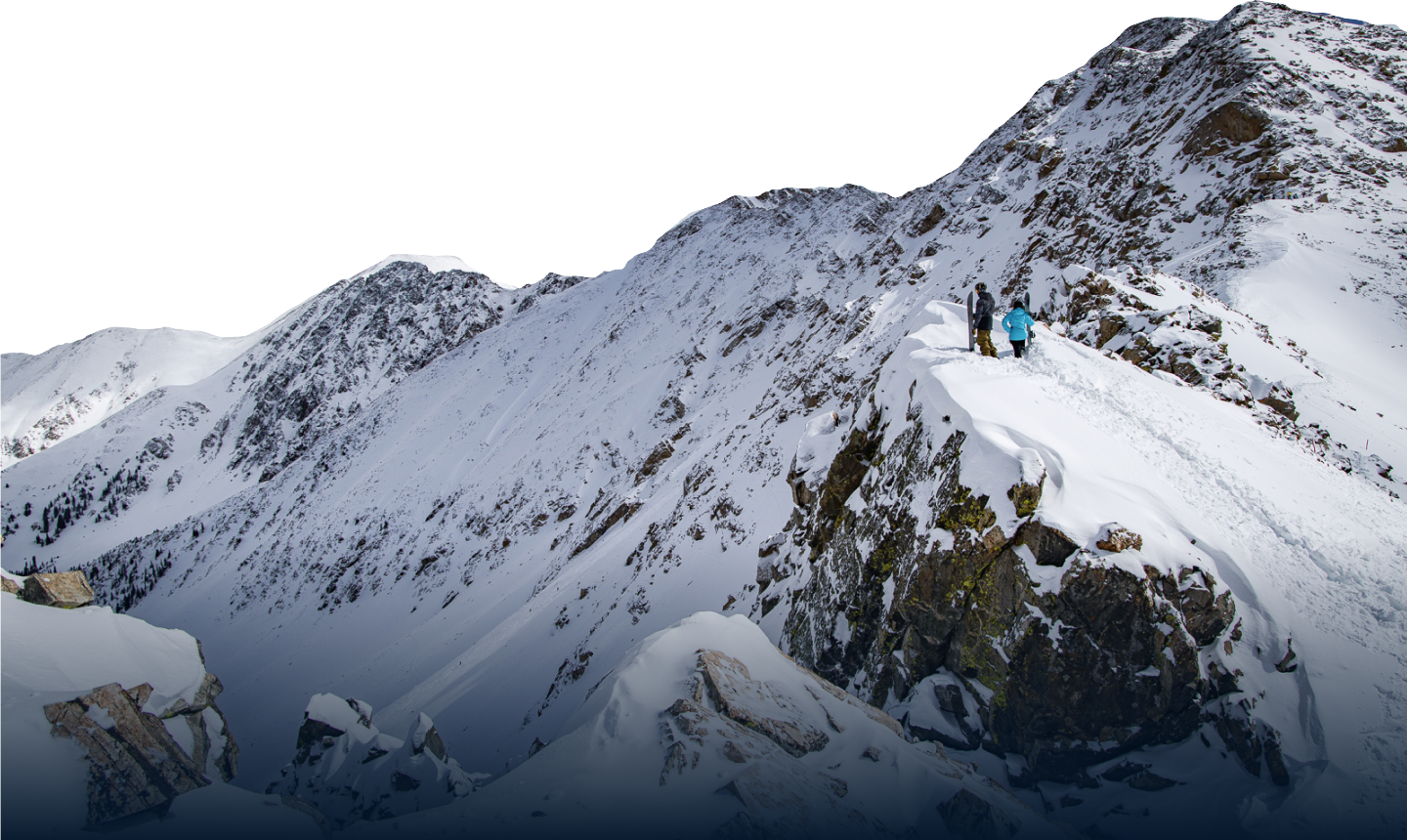 Arapahoe Basin East Wall with two skiiers standing on a cliff overlooking the mountain