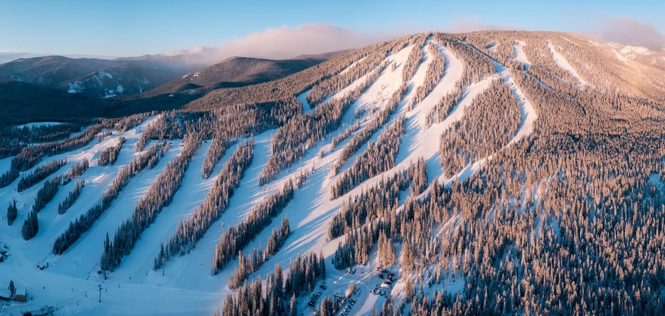 Aerial view of Eldora ski resort with cut and groomed snow covered trails