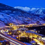 Aerial View of Vail village at night with I-70 Interstate visible and buildings light up