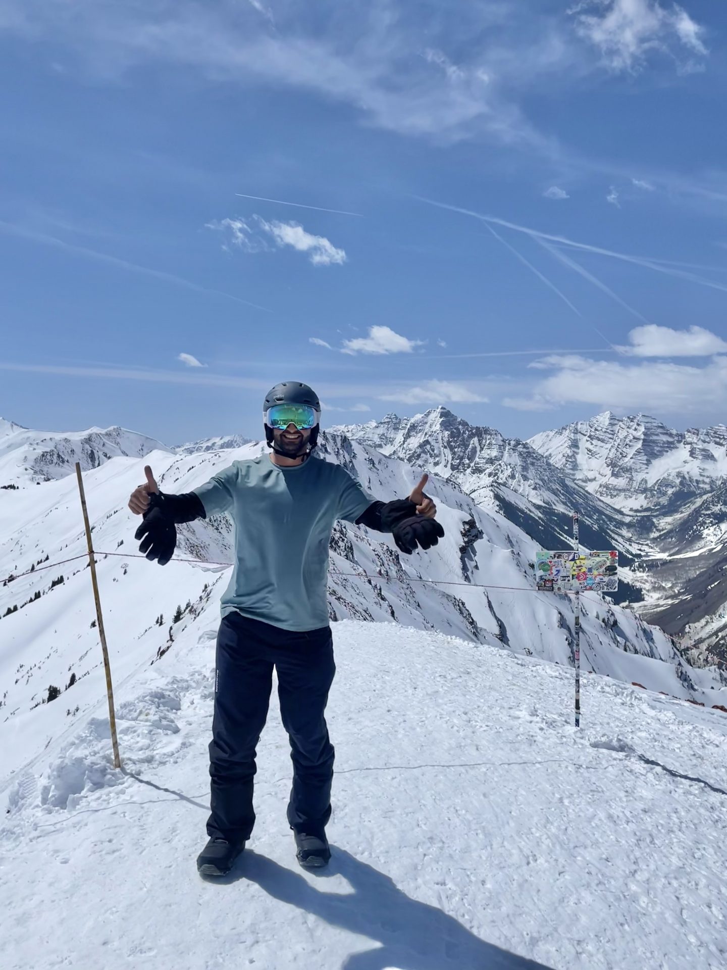 Skier snowboarder on top of Highland Peak in Aspen, Colorado, Skizi Founder Michael H